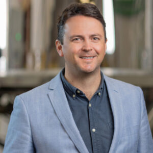 Headshot of IperionX Chief Commercial Officer, Dominic Allen