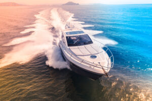 Boat on the water. Titanium is often used in marine applications and desalination plants due to its natural corrosion resistance in salt water and other harsh environments.
